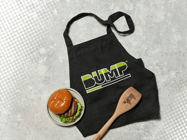 Bump Branded Apron, Branded Wooden Ladle and Burger on White Surface