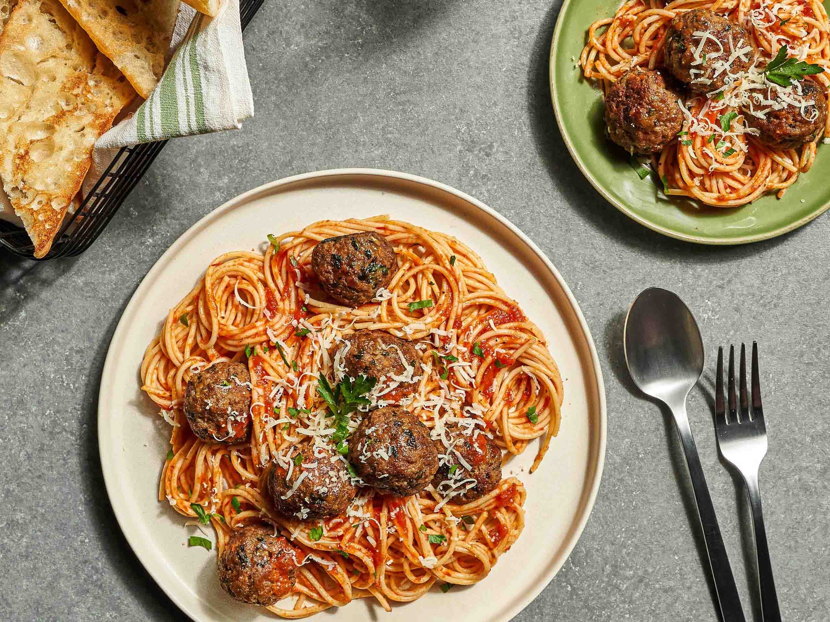 Red Sauce Spaghetti with Bump Meatballs, Cheese and Parsley Garnish