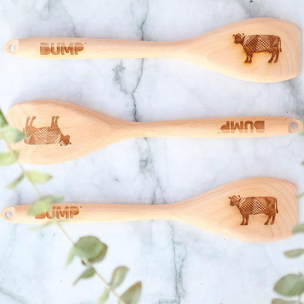 Picture of three large wooden spoons with Bump cow logo.